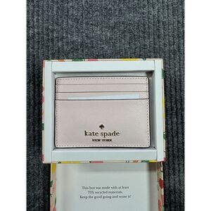 kate spade pale pink card holder with gold logo